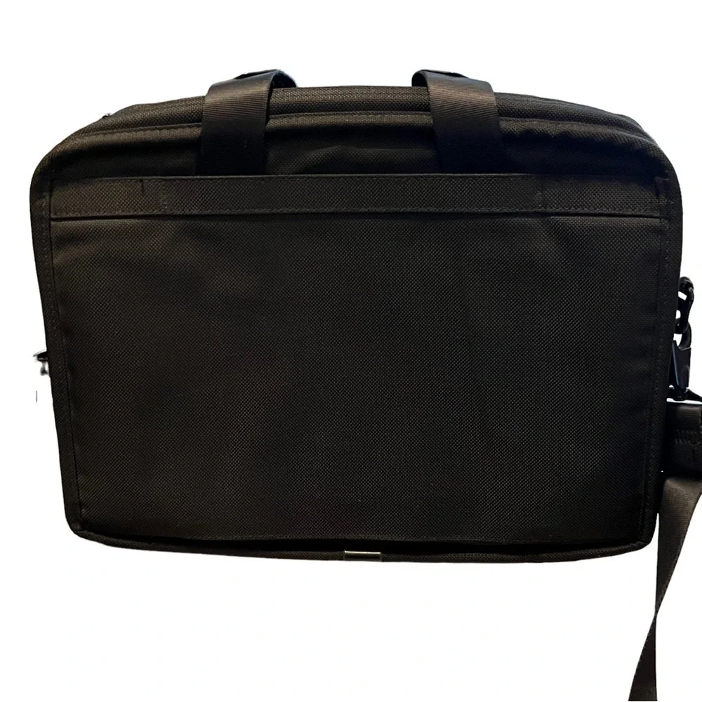 Tumi Travel Canvas Messenger Bag with Travel Slip And Shoulder Strap Laptop
